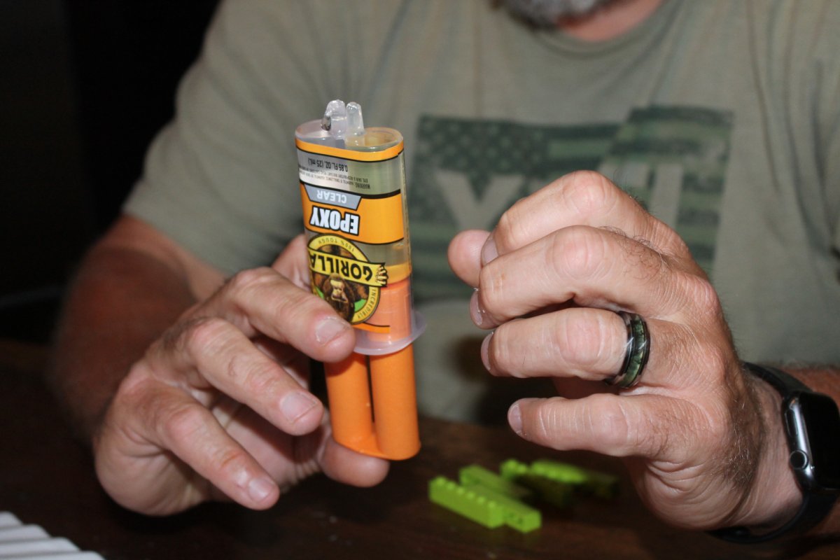 a man using Gorilla Glue Epoxy