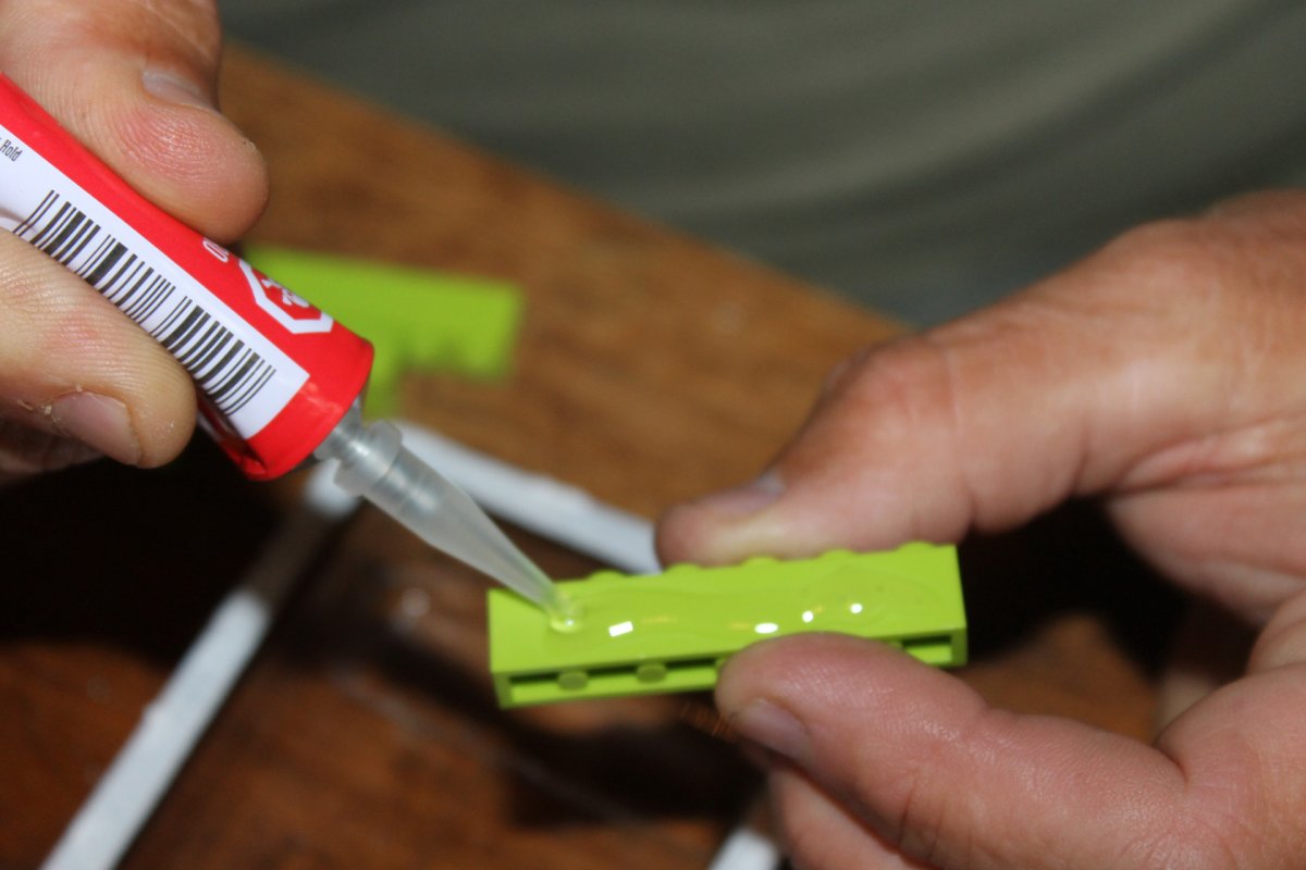 Testors Cement Glue applying to plastic