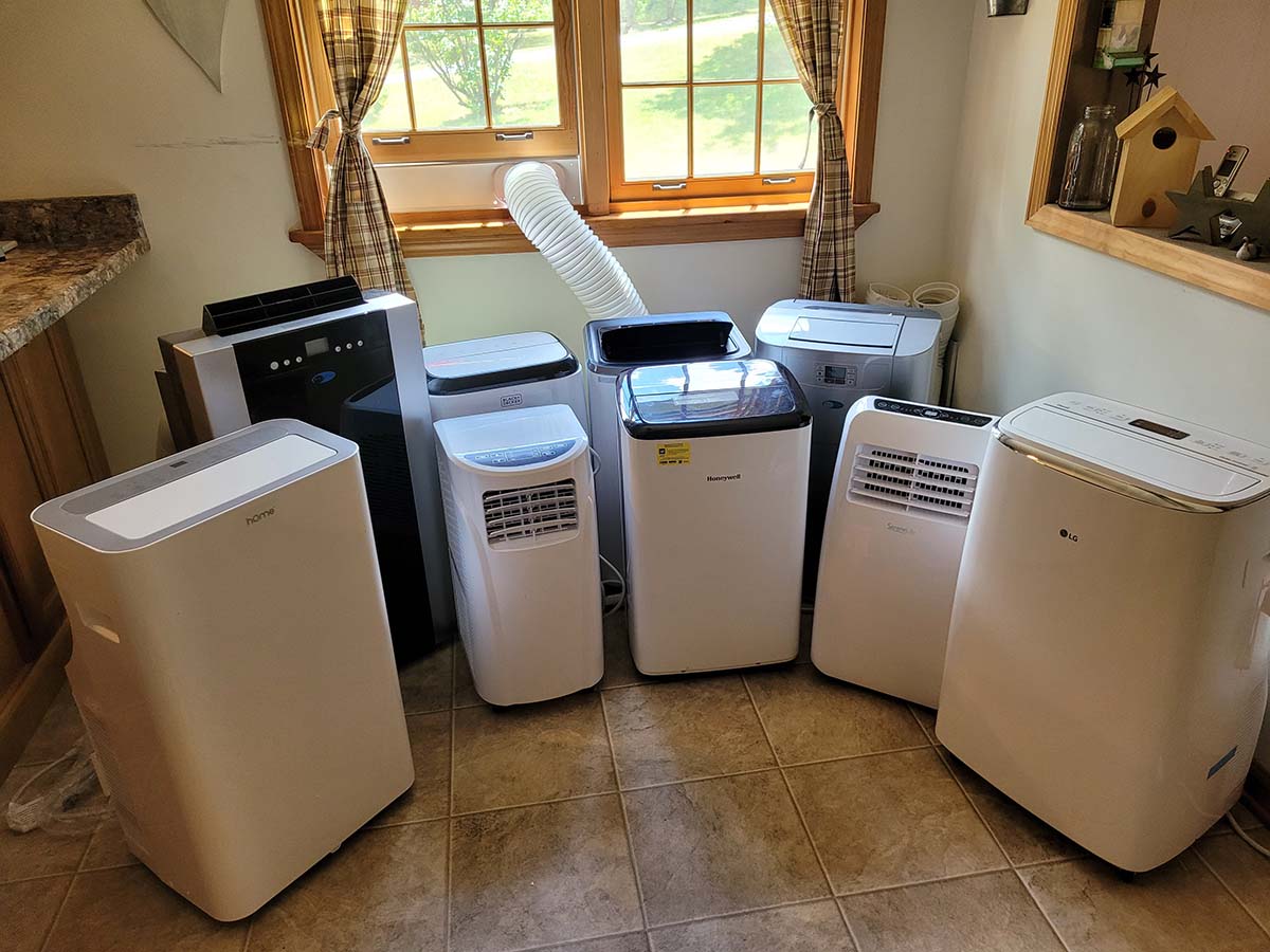 A large group of the best portable air conditioner options sitting together in a room