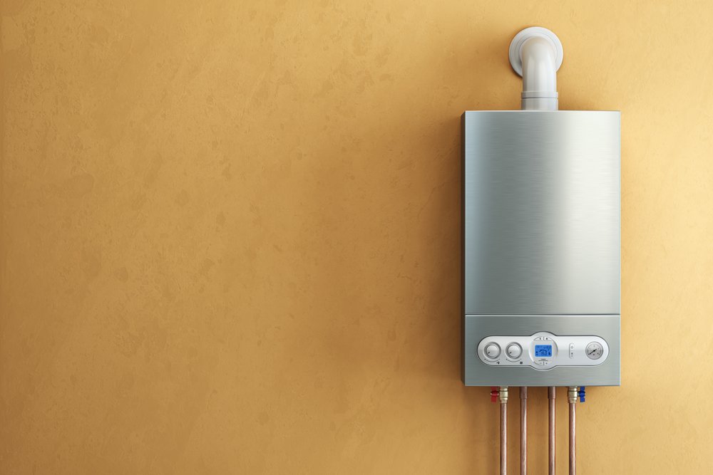 The best tankless water heater option mounted on a plain tan wall