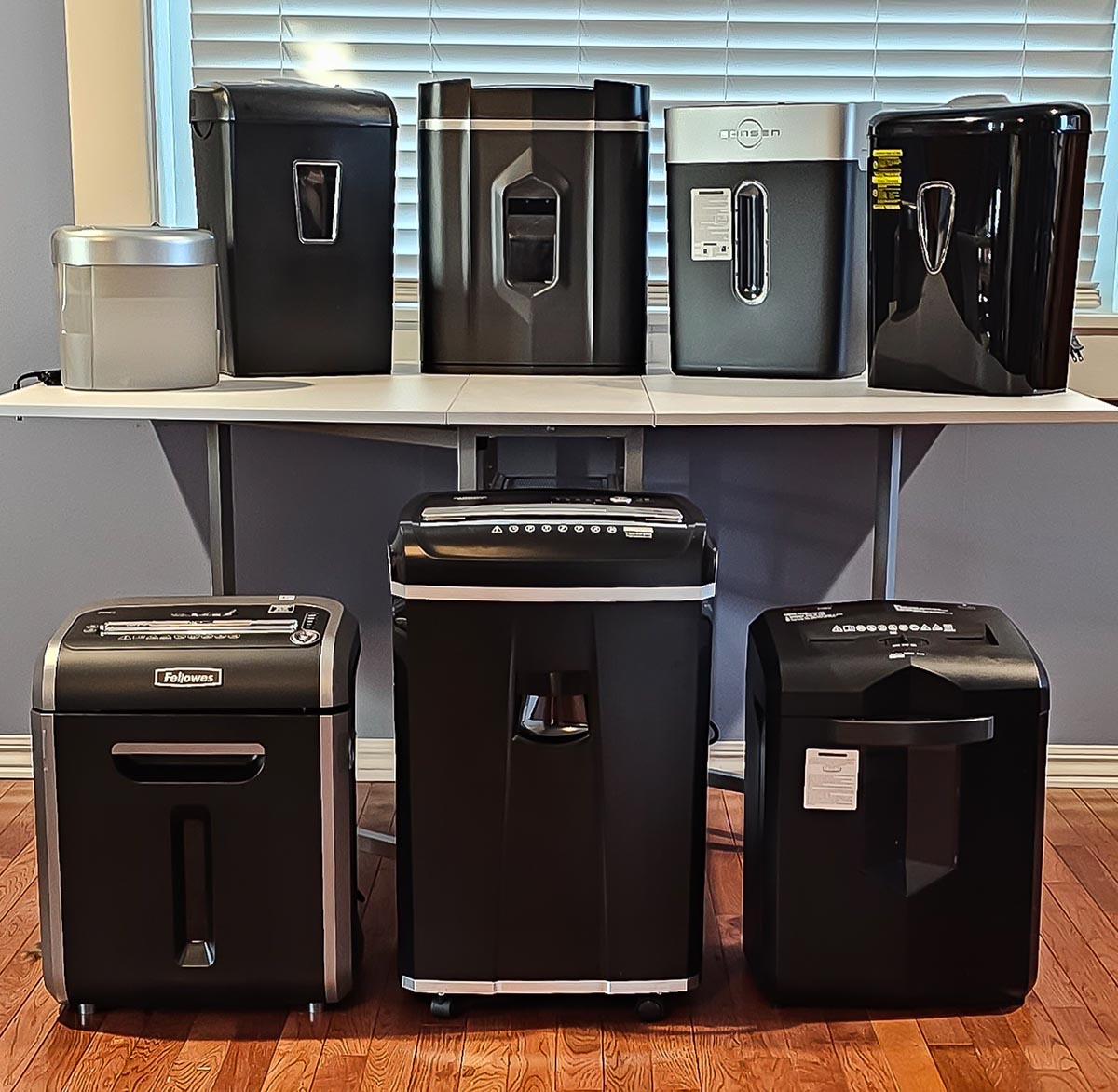 A group of the best paper shredder options grouped together in an office setting