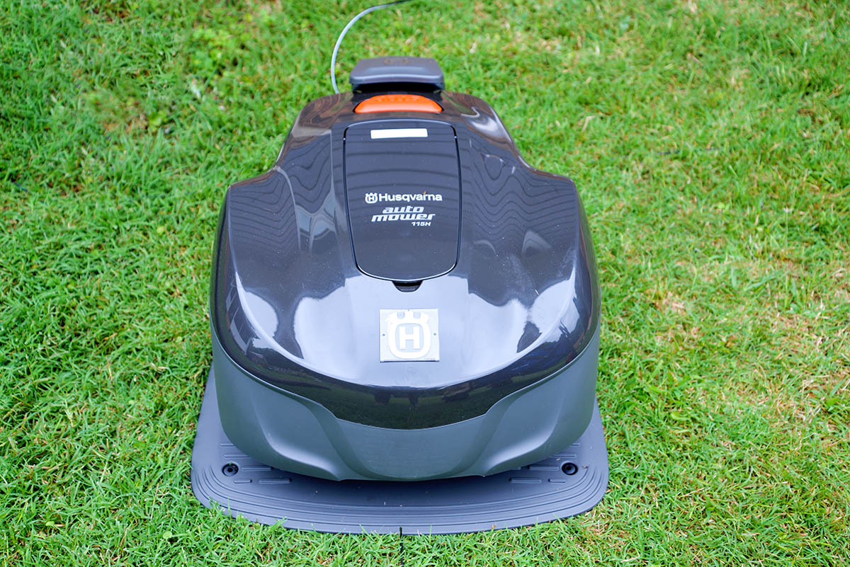 The best robot lawn mower option at work mowing a green lawn