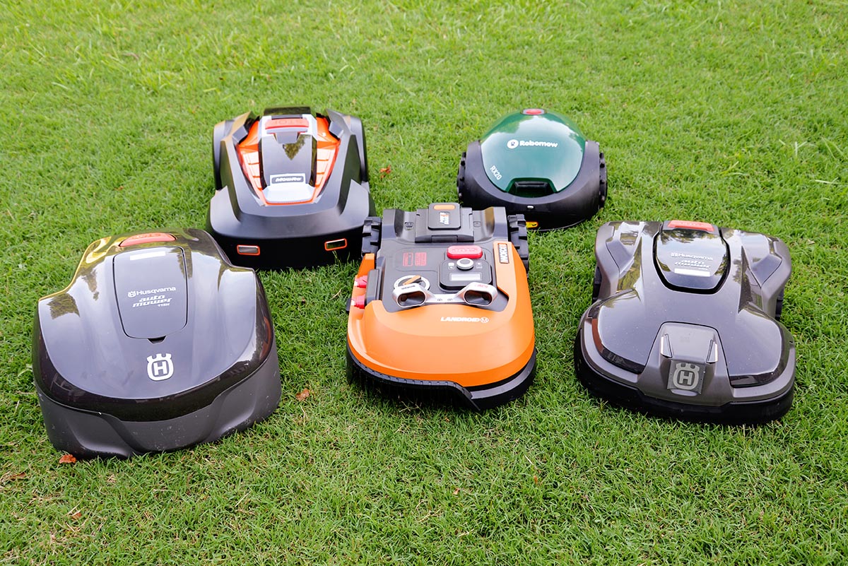 A group of the best robot lawn mower options together on a green lawn