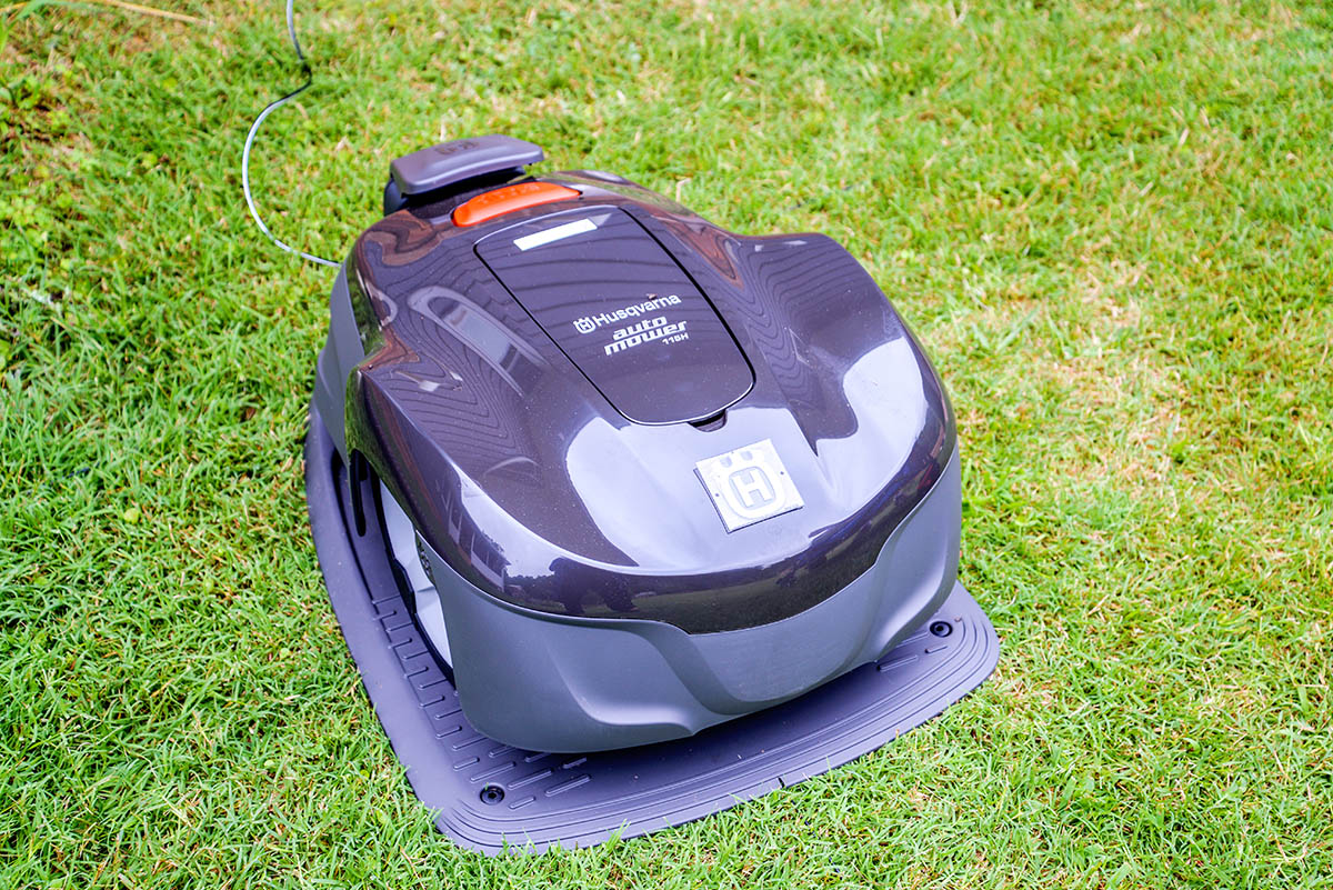 The best robot lawn mower option at work mowing a green lawn