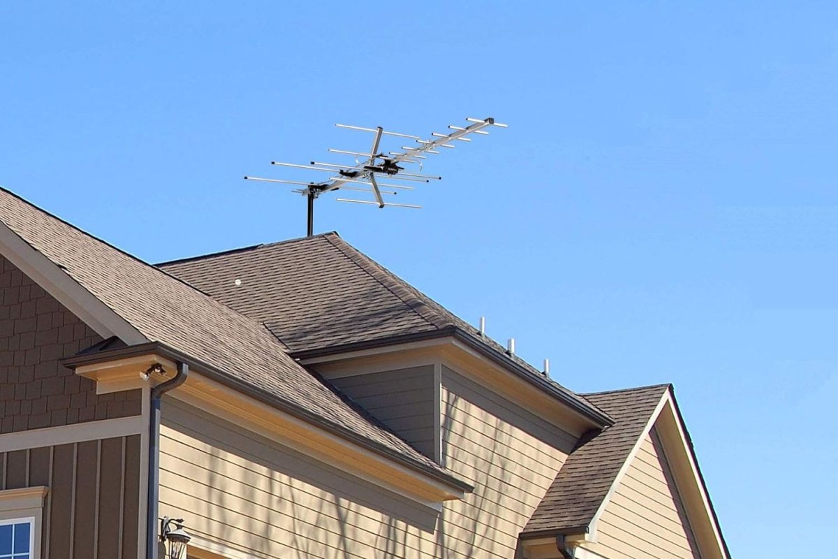 TV Antenna set outside on the roof of a hoouse