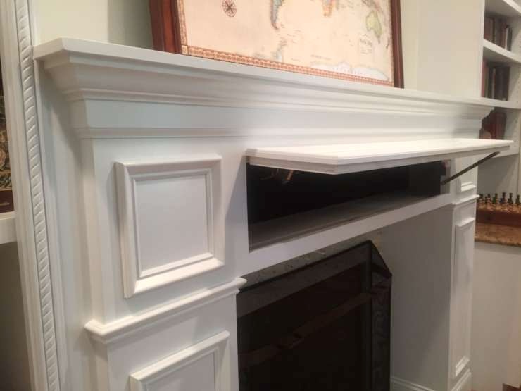 Covert Concepts custom mantel hidden storage open door.