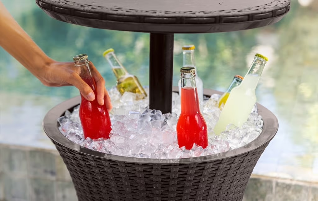 Keter rattan side table that doubles as a cooler.