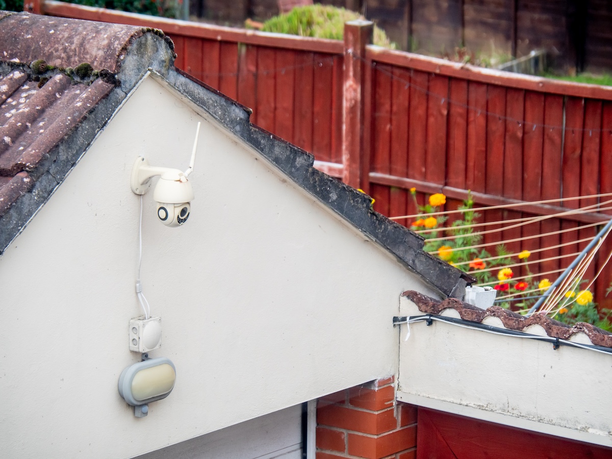 A home security surveillance system on a residential garage.