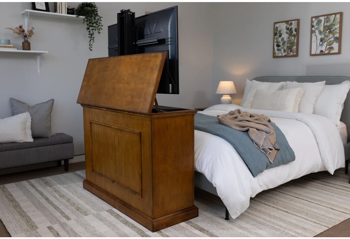 Touchstone The Elevate TV lift cabinet at foot of bed