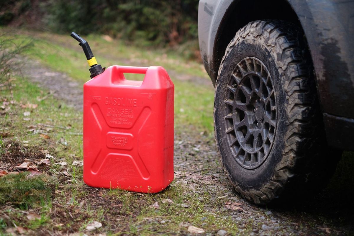 The best gas can option on the ground next to a truck tire