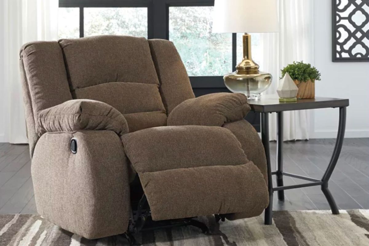The best recliner option partially extended in a living room next to a decorated side table