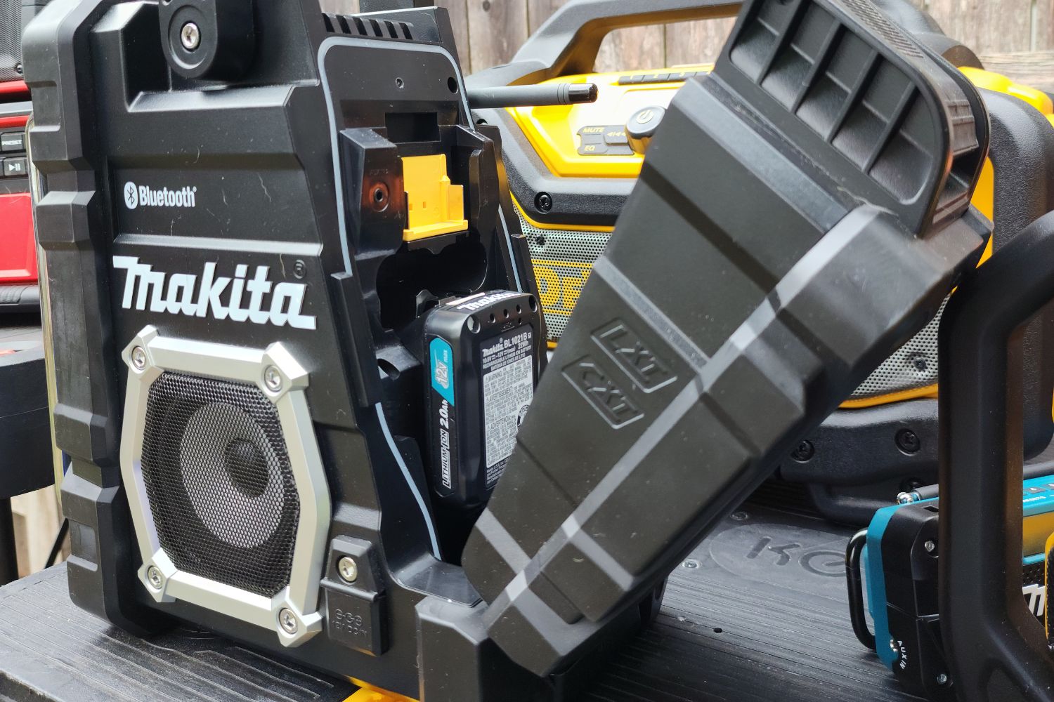 Closeup of Makita jobsite radio and battery