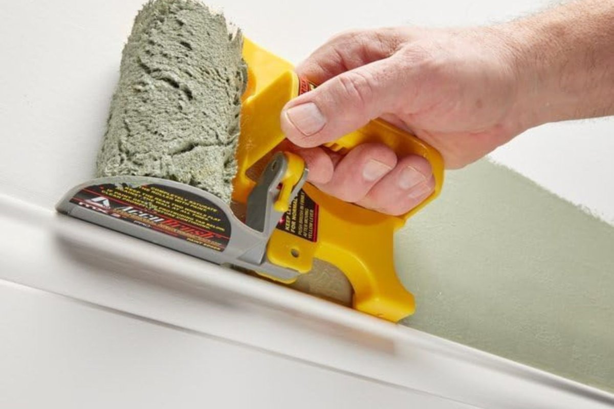a man using paint edger 