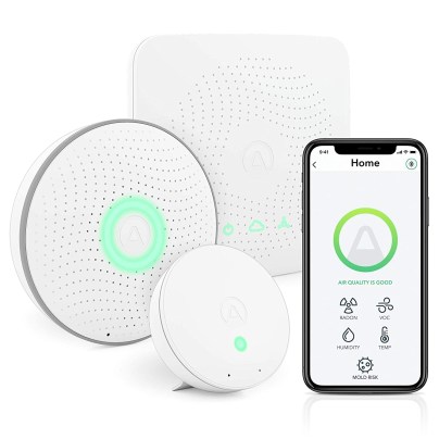 Airthings 4200 House Kit next to a smartphone on a white background
