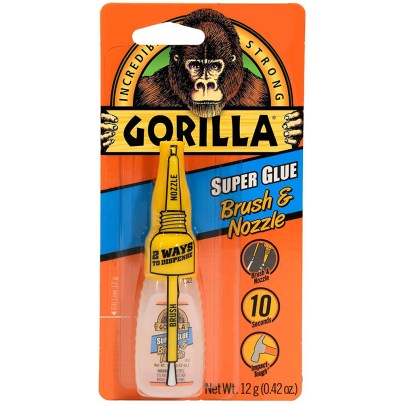 A bottle of Gorilla Super Glue Brush & Nozzle in its orange package.