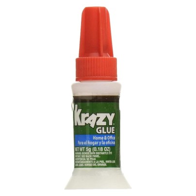 A green, white, and orange bottle of Krazy Glue Home & Office Brush-On Glue on a white background.