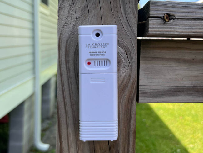 An installed outdoor thermometer