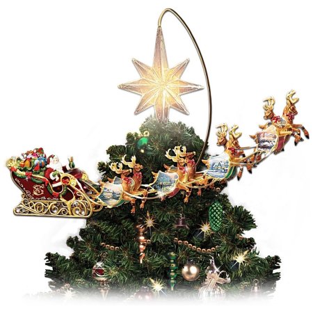 The The Bradford Exchange Motion Illuminated Tree Topper on a tree with a white background.