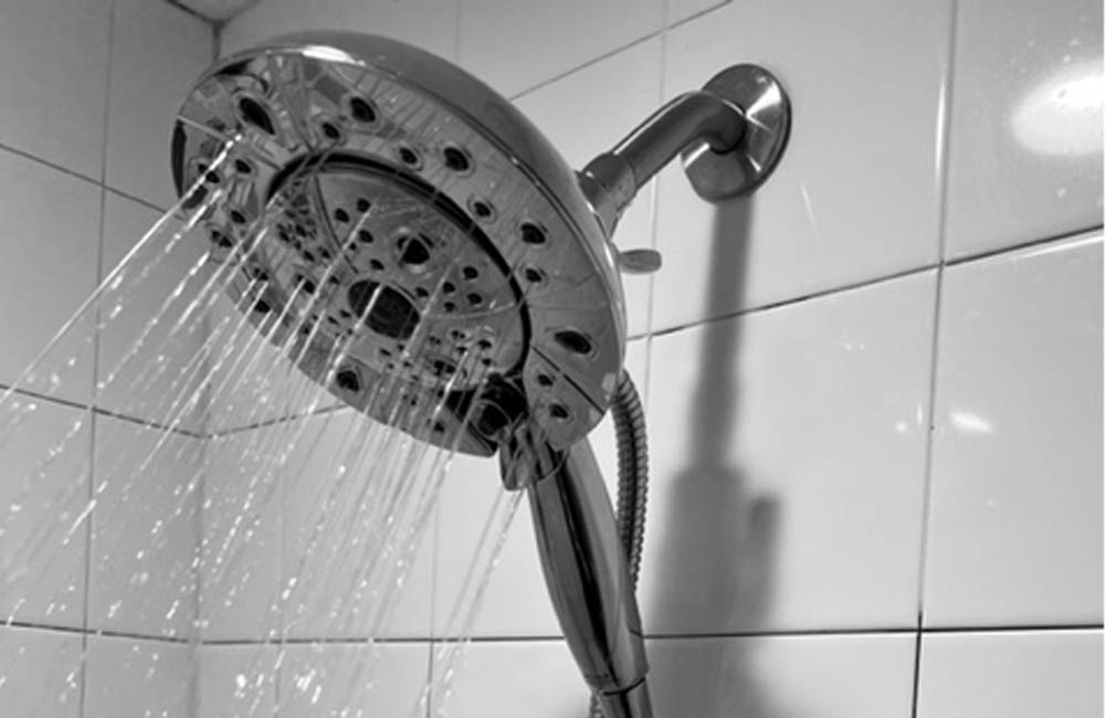Water running from one of the Best Handheld Shower Head Options