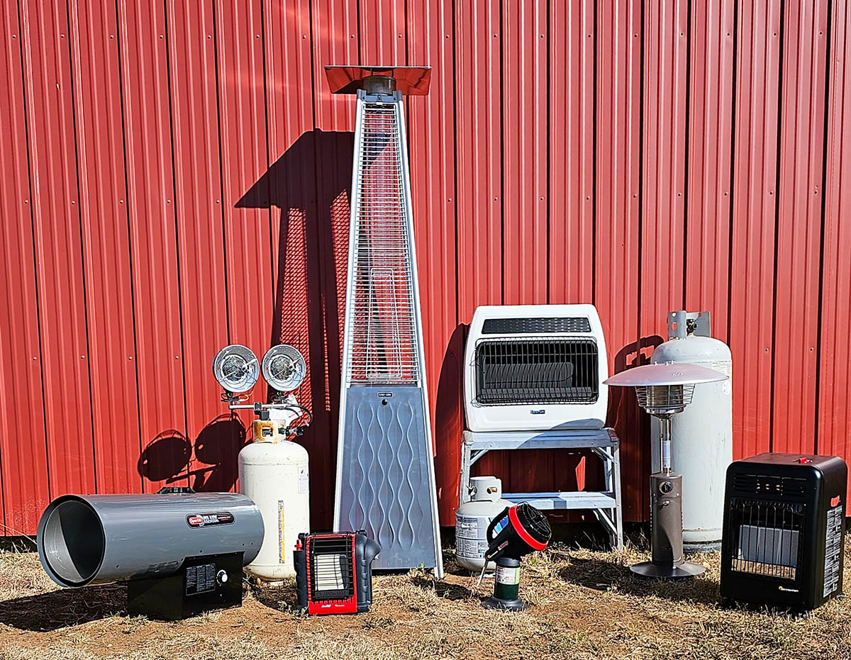 The Best Propane Heater Options set together against the side of a red barn.