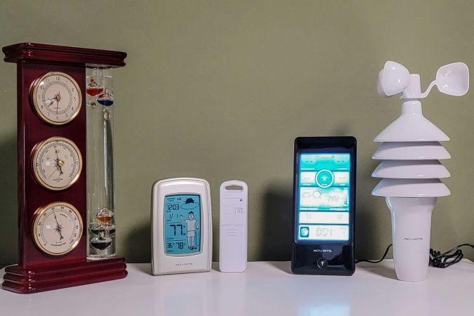 A group of the best home weather stations together on a table before testing.