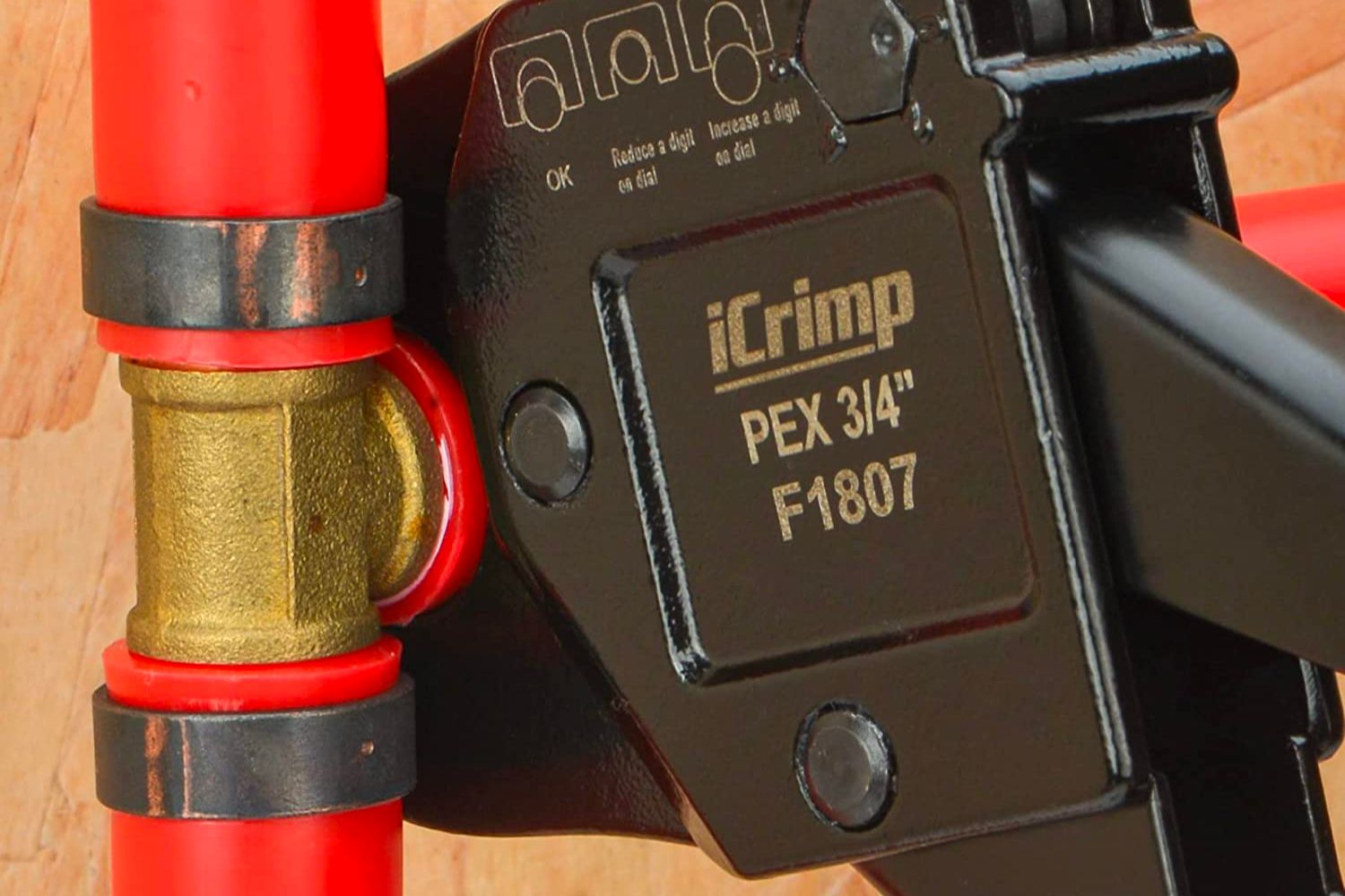 A close-up of the best PEX crimp tool