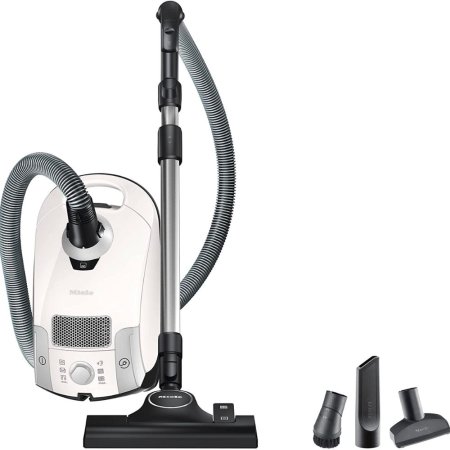  The Miele Compact C1 Pure Suction PowerLine and its accessories on a white background.