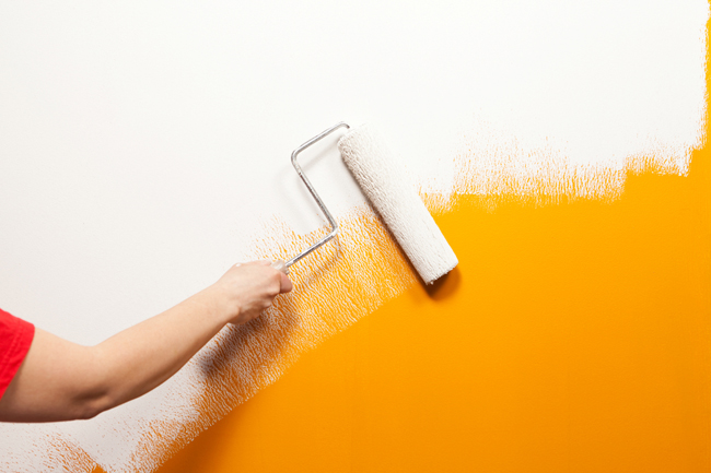 painting yellow wall white