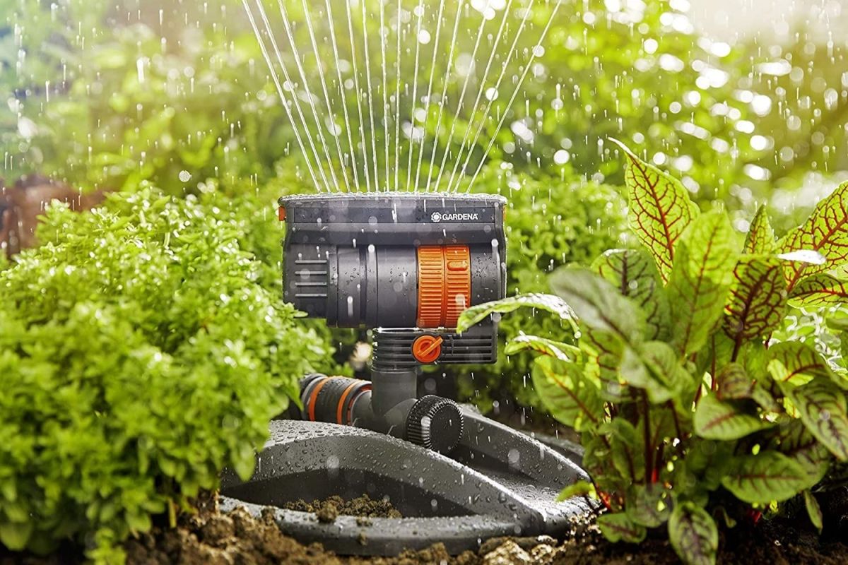 The best oscillating sprinklers option spraying a lush group of plants
