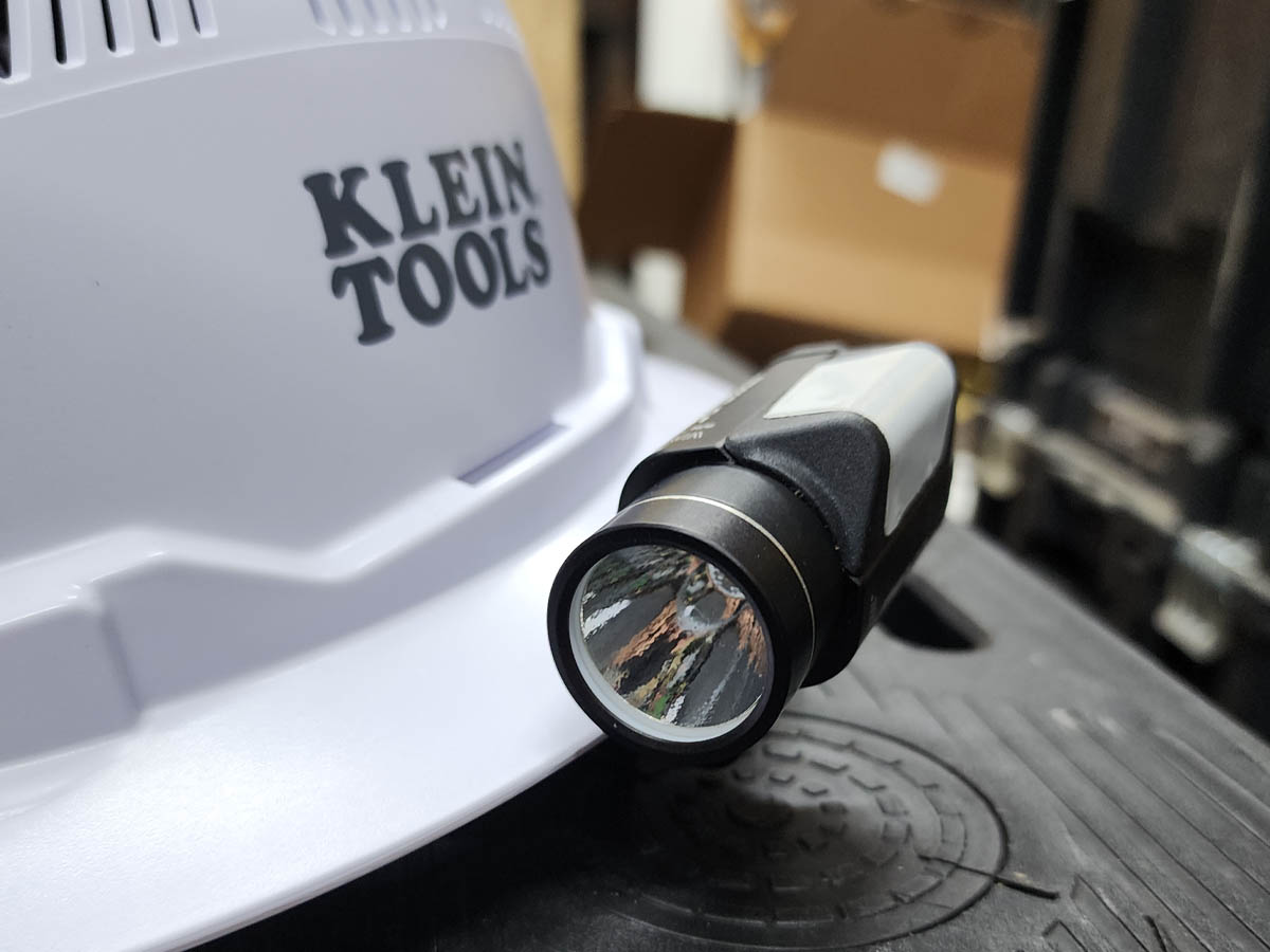 Close up of the best hard hat light option viewed from the side to show attachment to hard hat