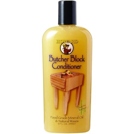 A bottle of Howard Products Butcher Block Conditioner on a white background.