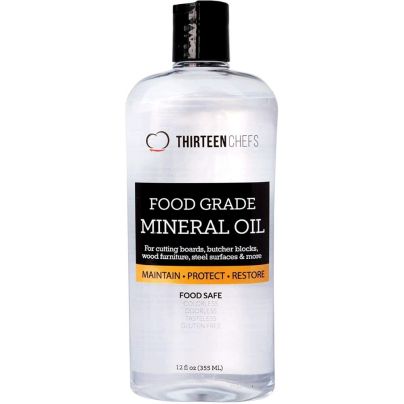 A bottle of Thirteen Chefs Food Grade Mineral Oil on a white background.