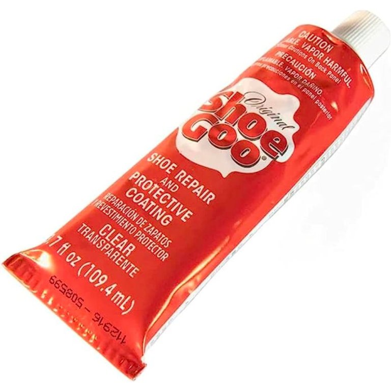  A tube of Shoe Goo Repair and Protective Coating on a white background.