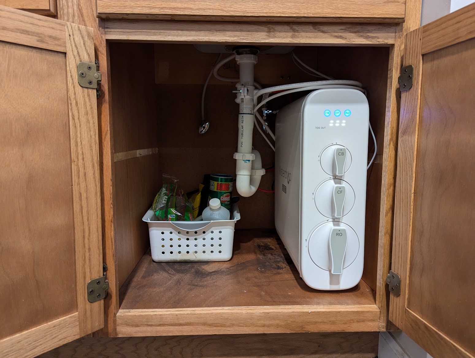 The Best Under-Sink Water Filter Waterdrop in cabinet view