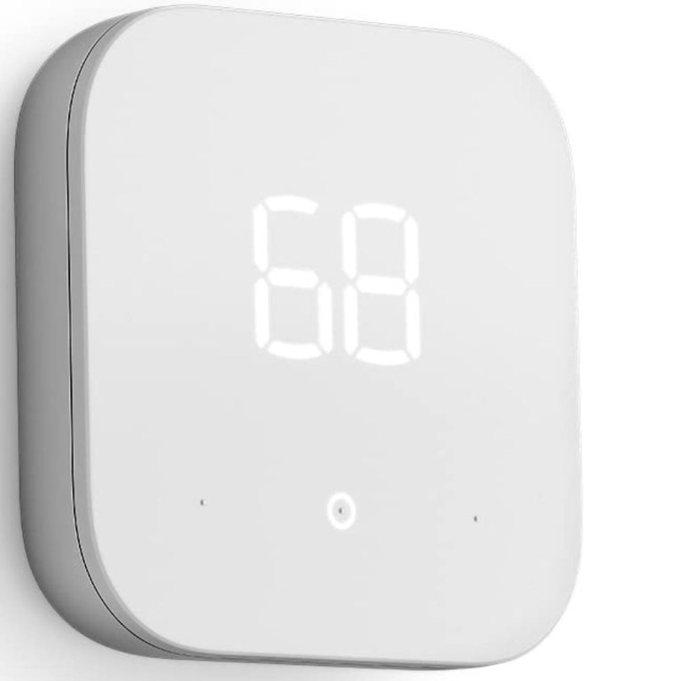  The Amazon Smart Thermostat on a white background set to 68 degrees Fahrenheit.