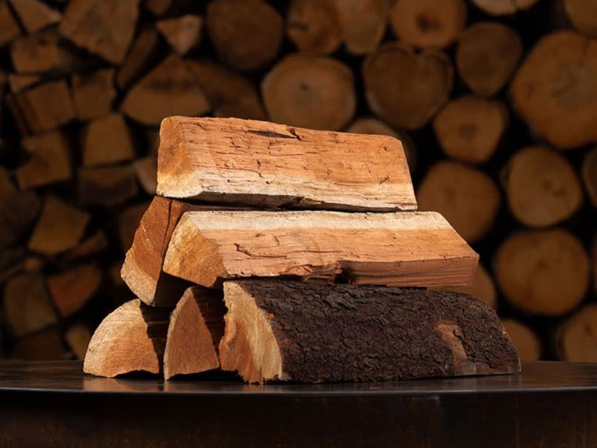 Stack of cherry firewood logs.