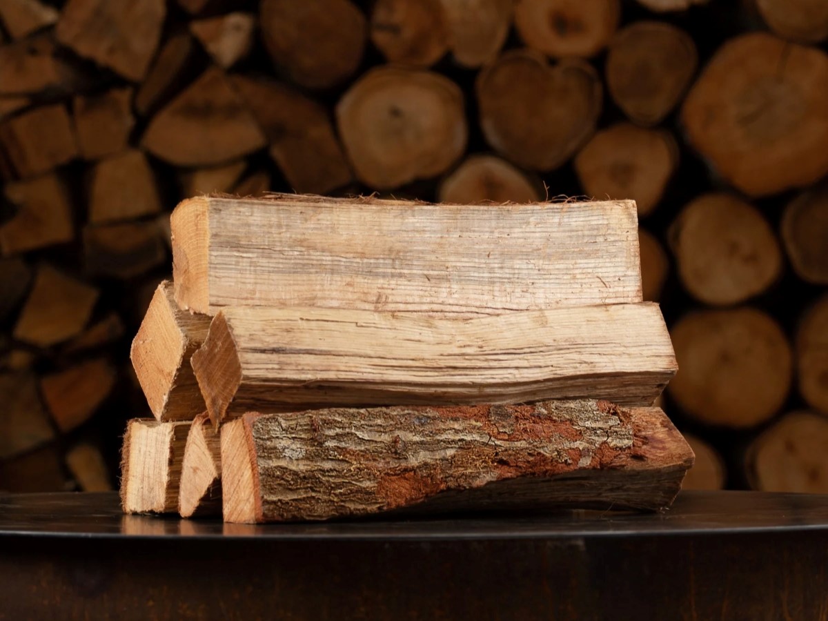 Stack of oak firewood logs.