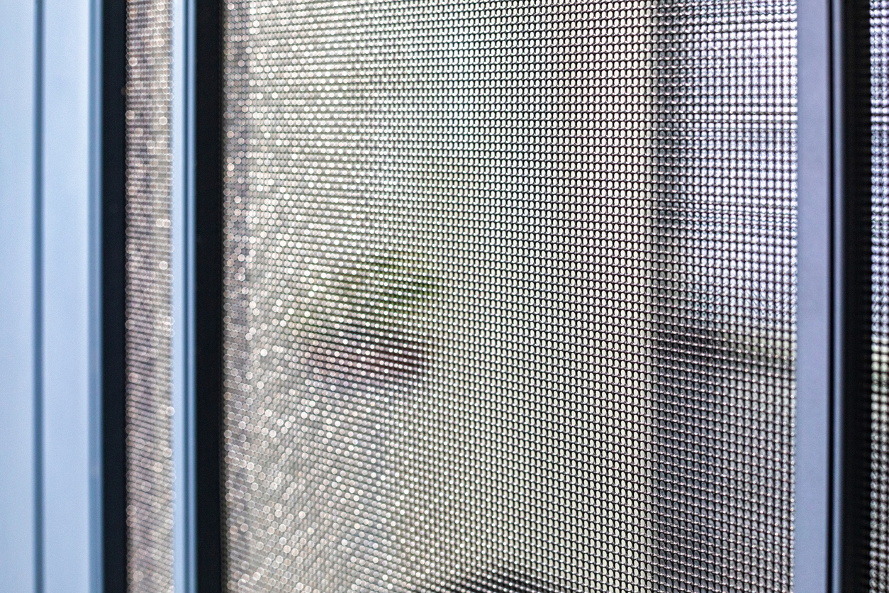 A screen door with an aluminum frame.