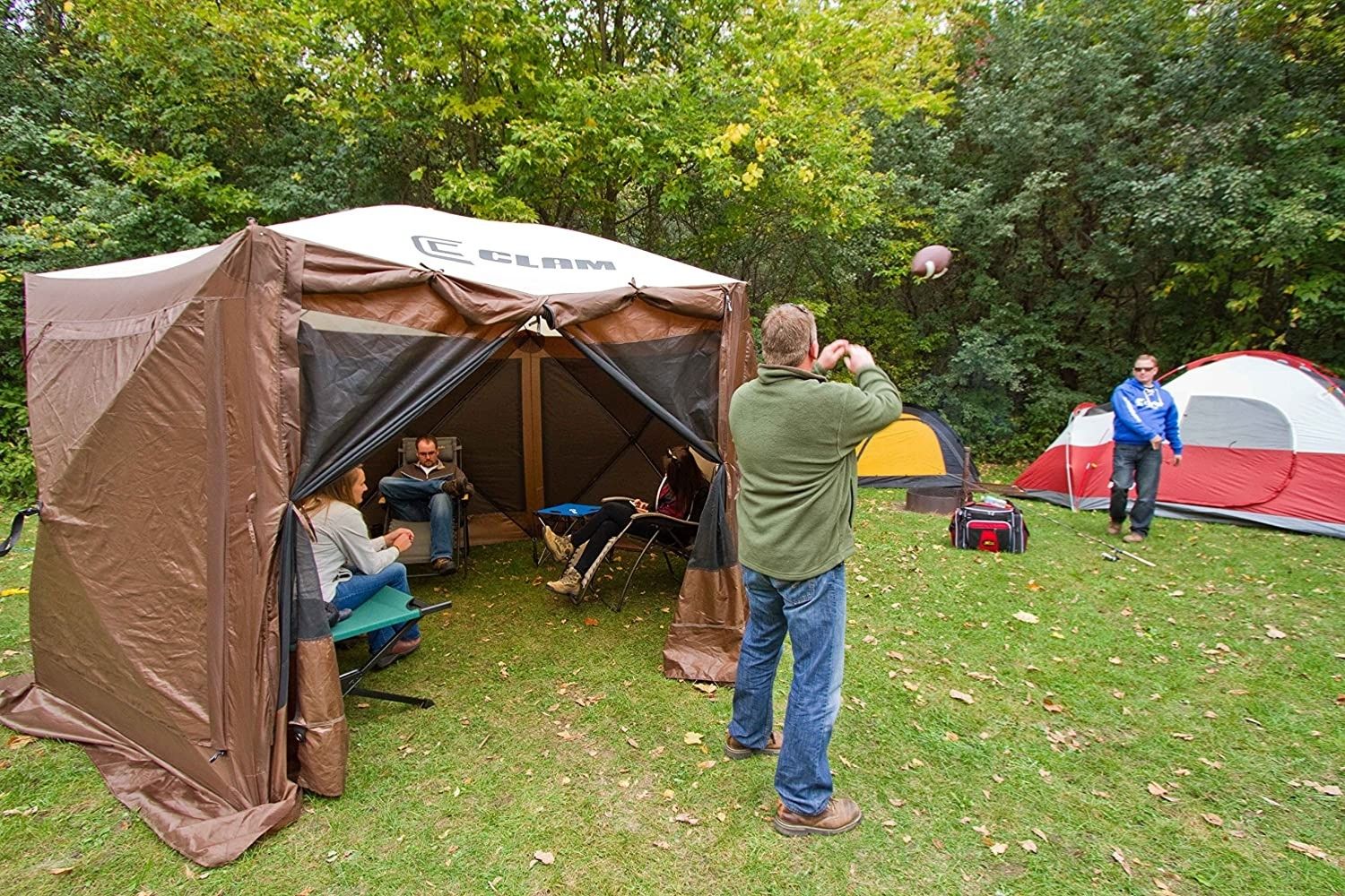 The Best Screen Tent Option filled with a group of people at a campsite
