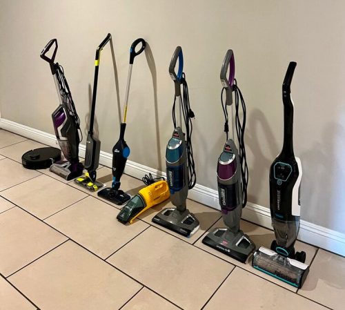 A group of the best vacuum mop combo options grouped together on a tile floor.