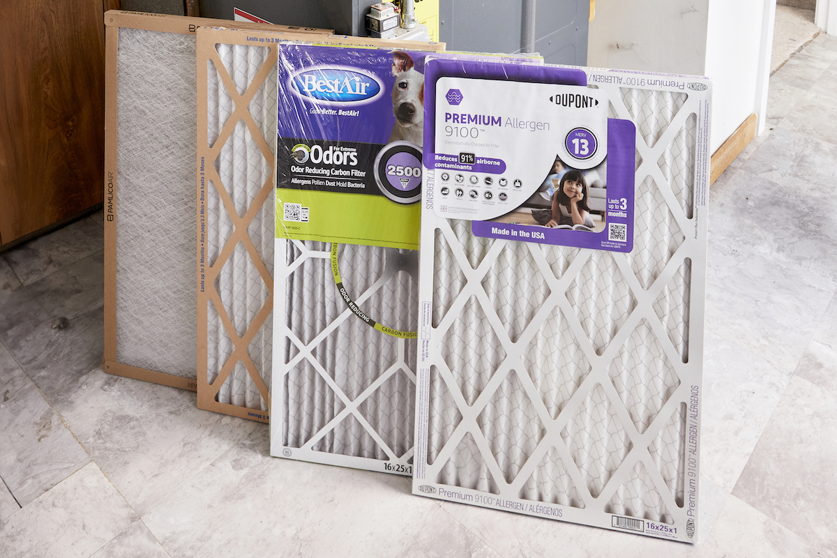 Four air filters still in packaging, some of which display MERV filter ratings.