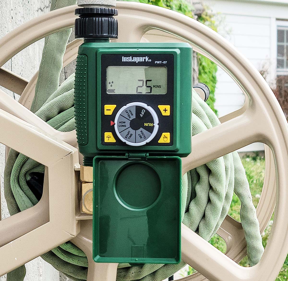 Instapark hose timer connected to hose reel