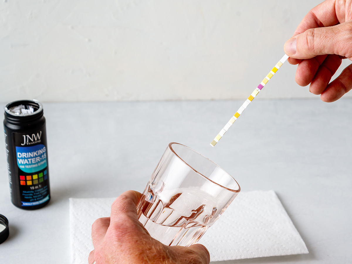 The best water test kit option showing the results of testing a glass of water