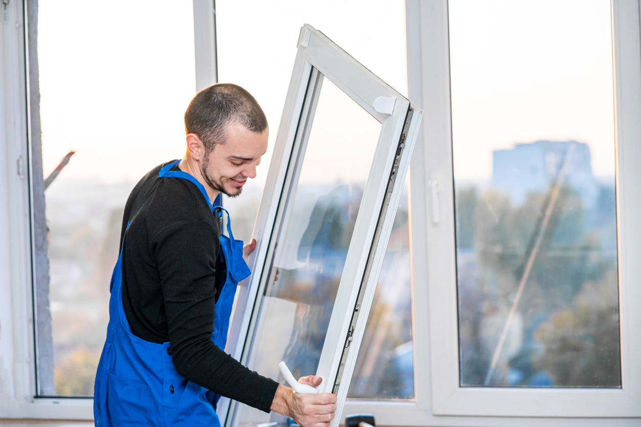 professional installing thermal pane windows