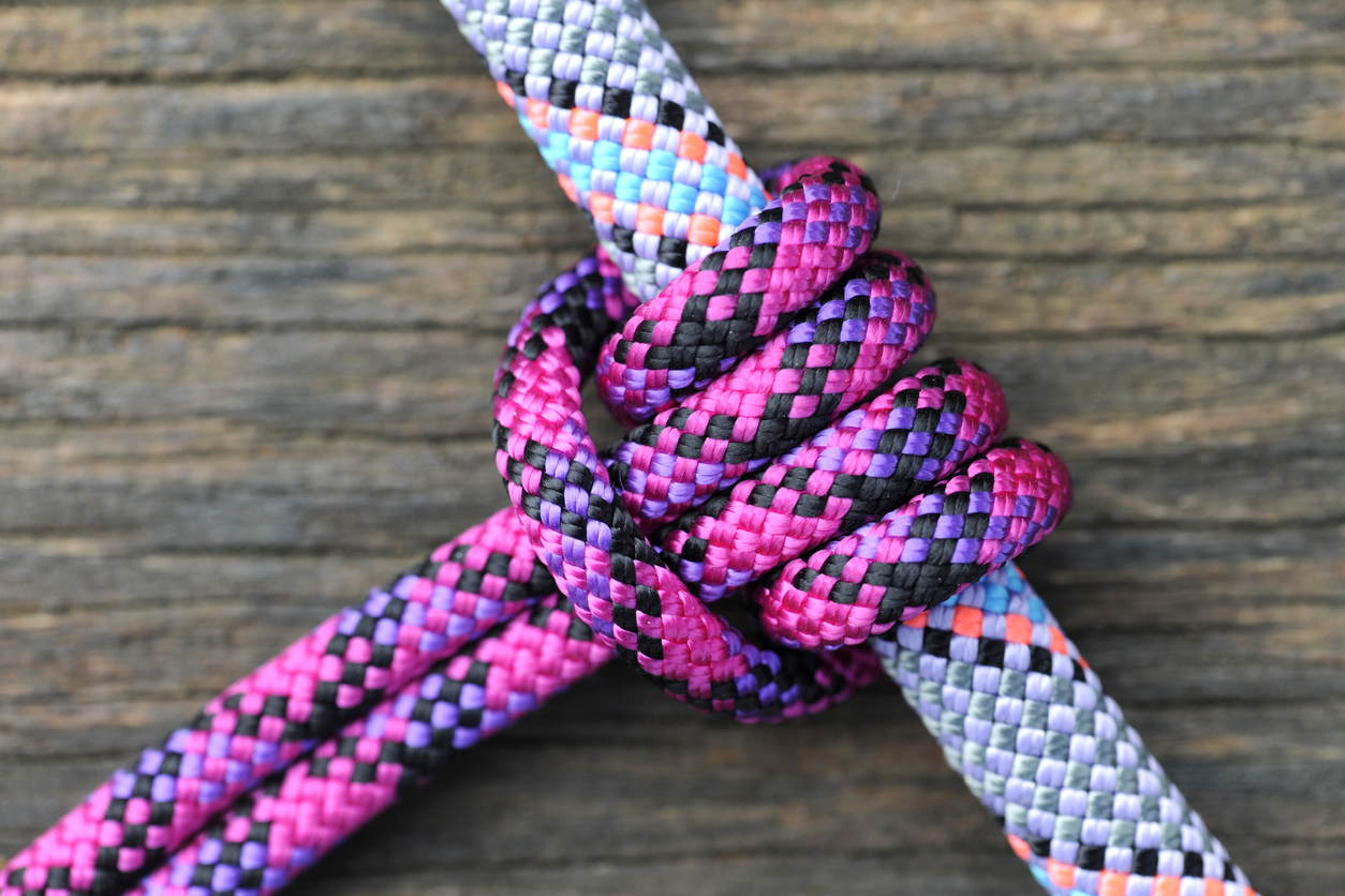 Close up of a prusik knot with two ropes.