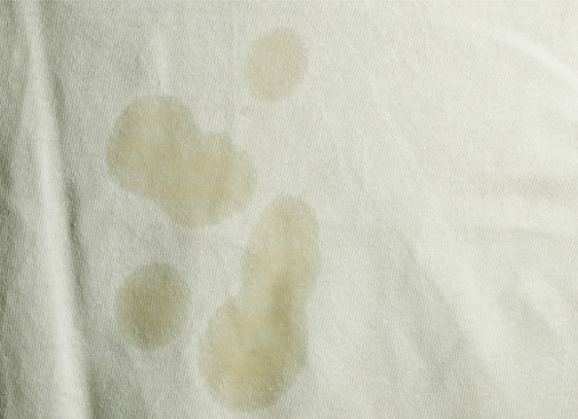 Oil stains on a light-colored garment