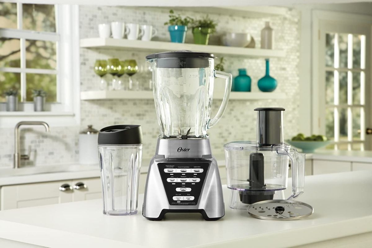 The best blender food processor combo option with numerous accessories on a kitchen counter