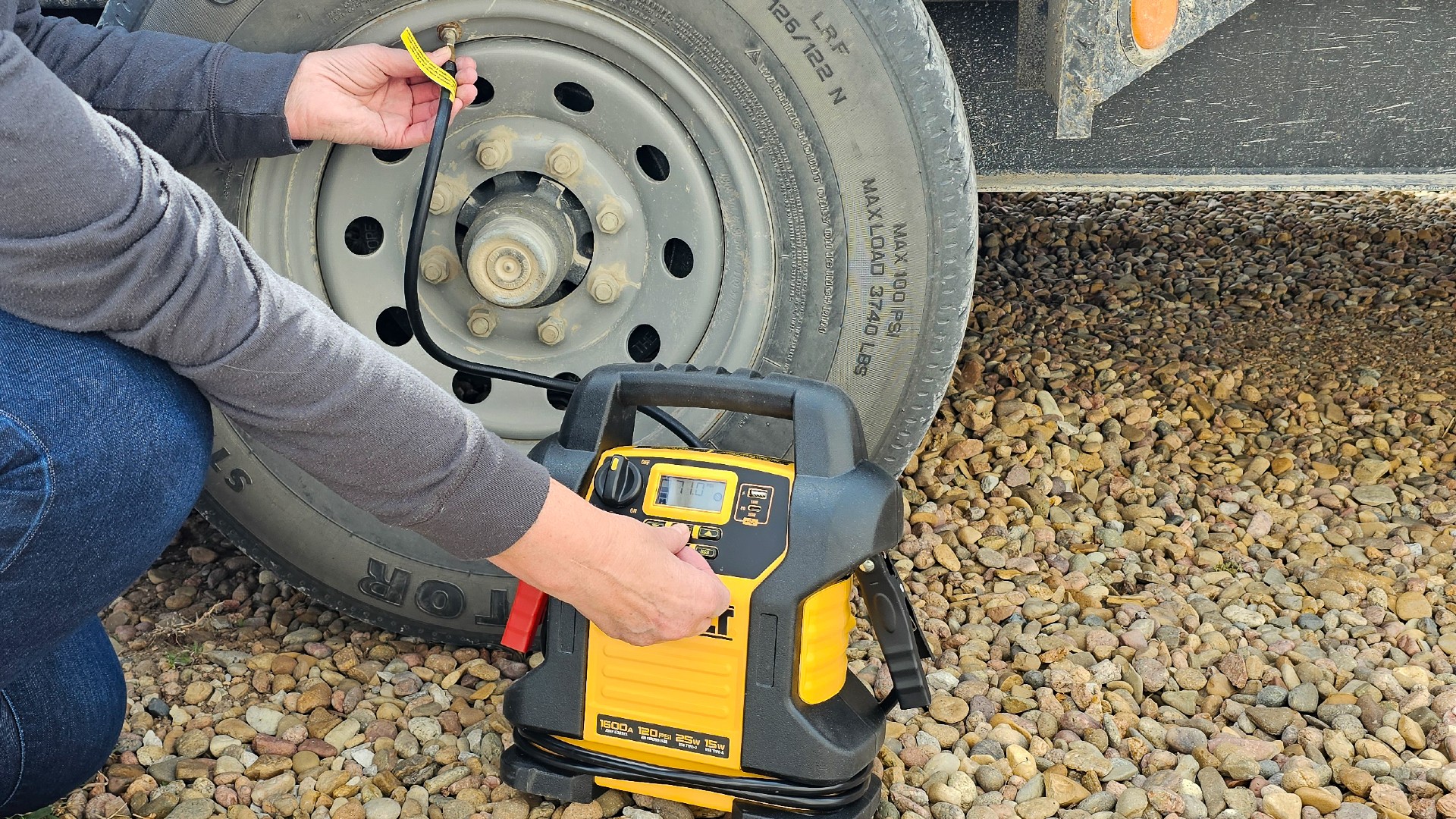 DeWalt inflating truck tire.