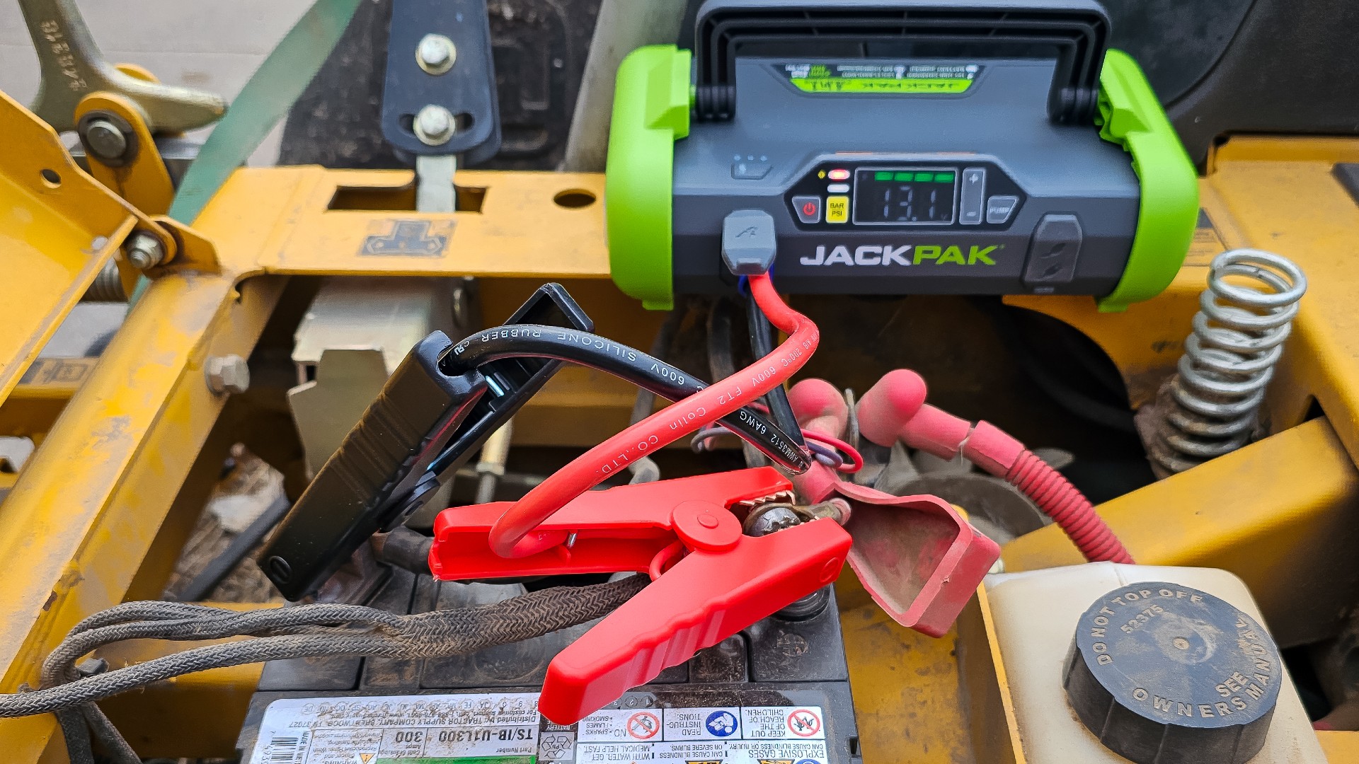 JackPack in use. Connected to riding mower battery