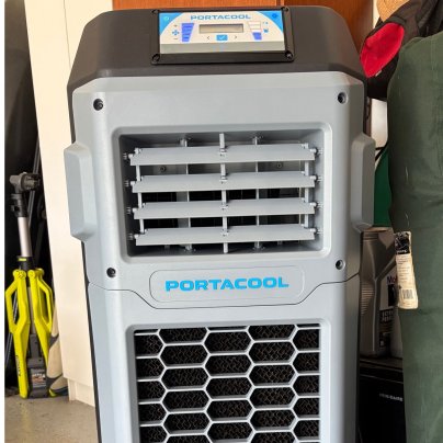The Portacool Apex 500 Wi-Fi Evaporative Air Cooler in a garage during testing